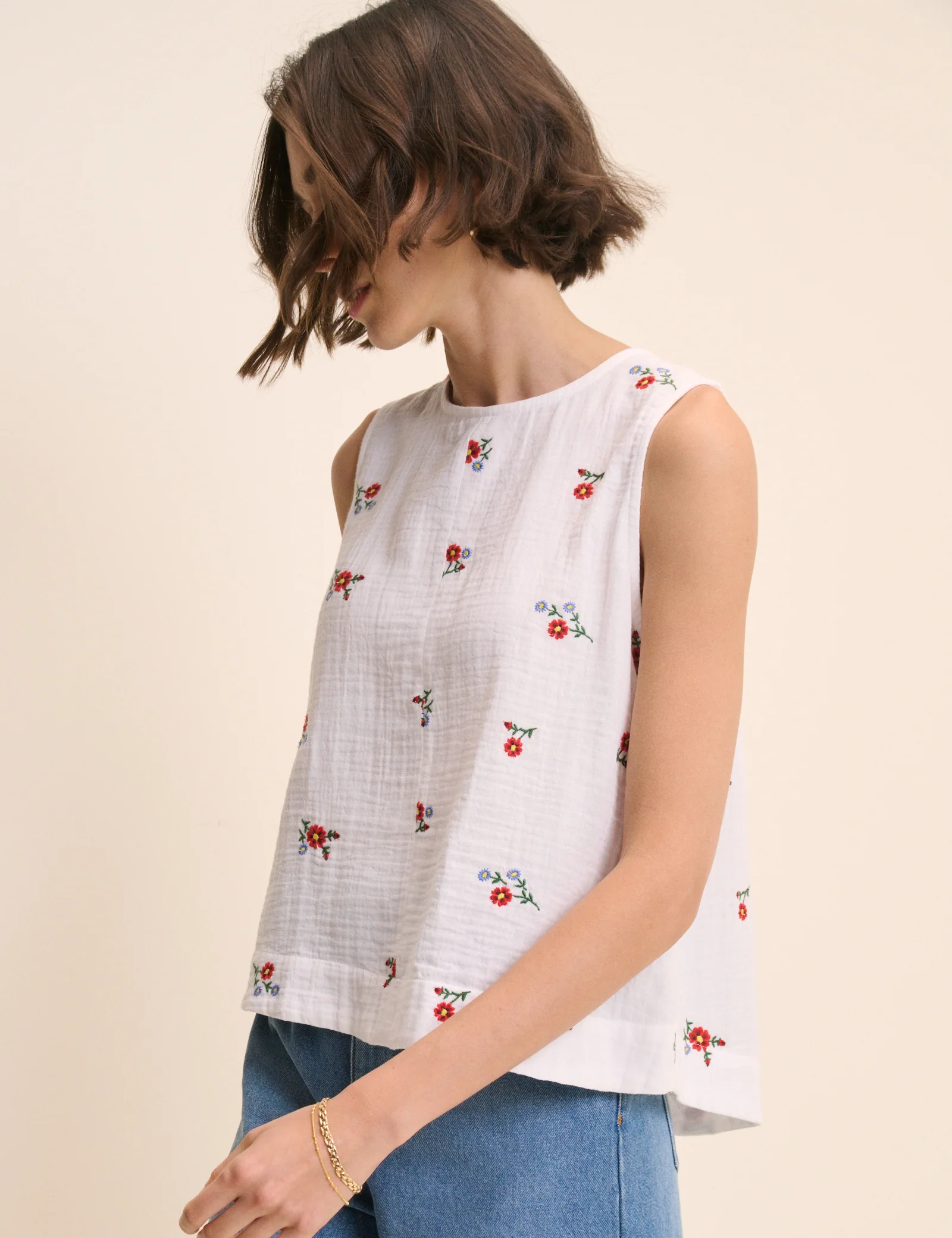 White Floral Embroidered Sleeveless Swing Top - Image 2